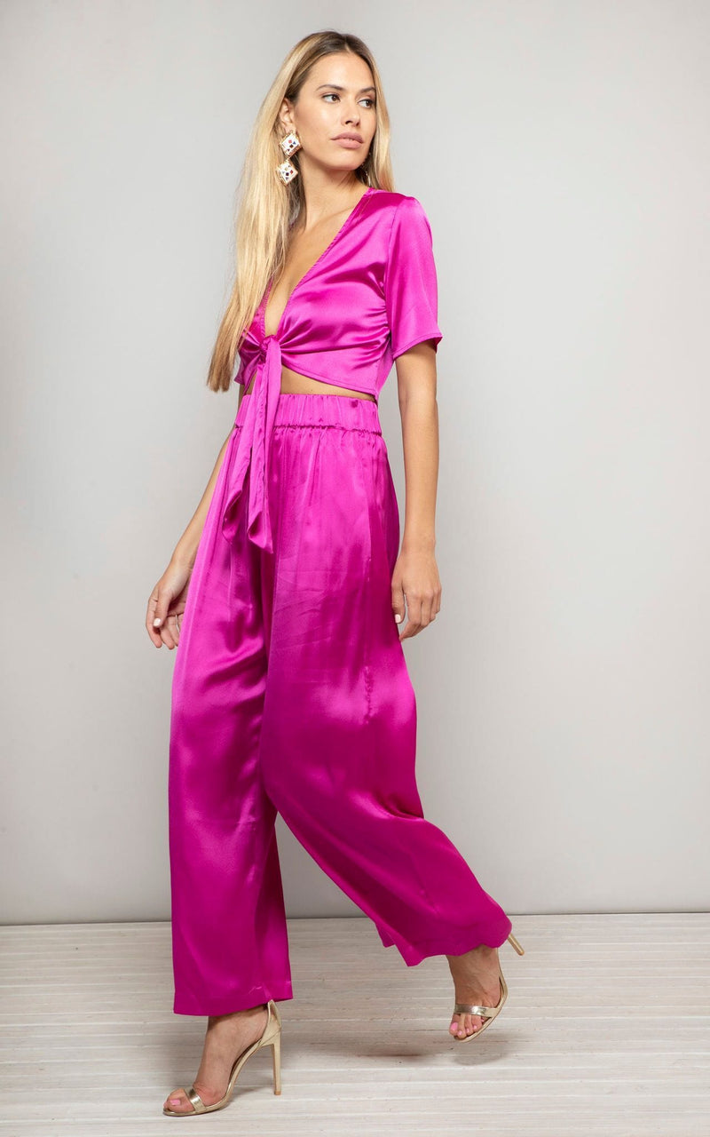 Full length side facing blonde model wears Chinchilla Pants In Magenta by dancing leopard